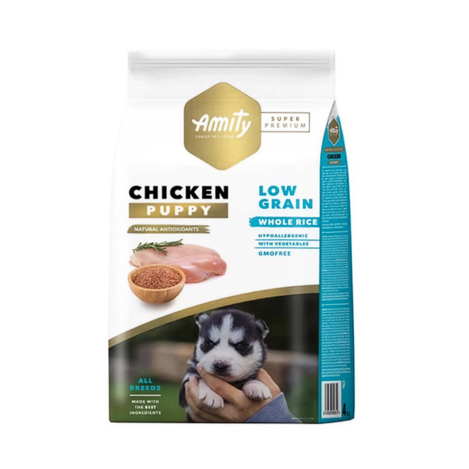 Amity Low Grain Pollo para Cachorros en bolsa de alimento seco, con pollo, arroz integral y fotografía de cachorro en portada.