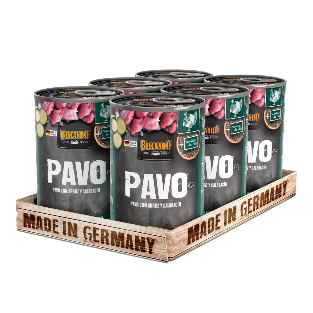 Belcando Lata Pavo con alimento húmedo para perros, receta de pavo con arroz y calabacín, presentada junto a porciones servidas.