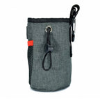 KONG Bolsa Porta Premios Train & Treat con bolsillo de malla, cierre ajustable y mosquetón para llevar snacks durante el entrenamiento.