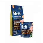 Brit Premium para Cachorros Razas Medianas con pollo en bolsa de alimento seco para perros junior de talla mediana, sobre fondo blanco.