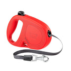 Correa Retráctil Flippy One con cinta retráctil negra, mango ergonómico y mosquetón metálico para paseos seguros con perros.