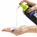 Shampoo Seco FURminator para Gatos en espuma sin enjuague, con dispensador y envase negro, diseñado para reducir el exceso de pelo.