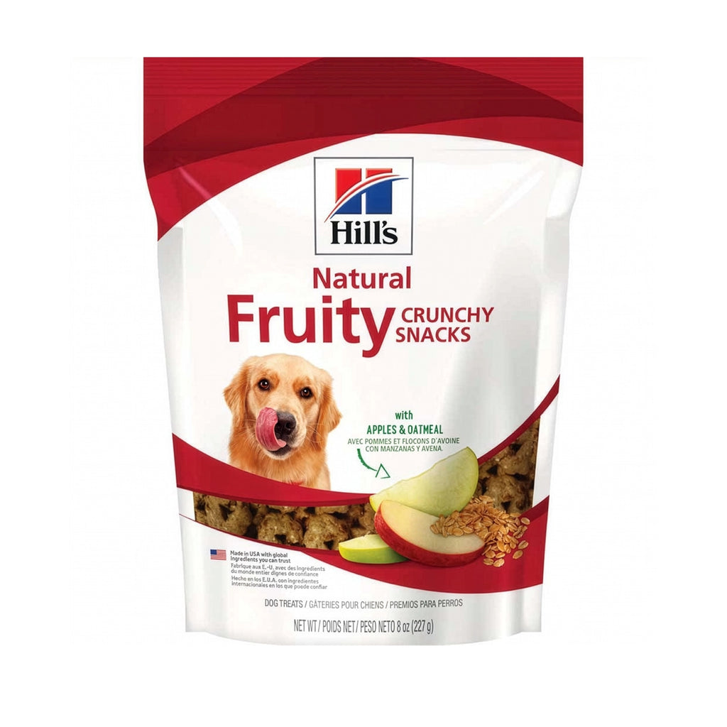 Hill's Galletas Crujientes Natural Fruity para Perros con manzana y avena, snack crujiente en bolsa con imagen de un perro.