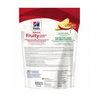 Hill's Galletas Crujientes Natural Fruity para Perros con manzana y avena, snack crujiente en bolsa con imagen de un perro.