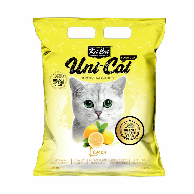 Kit Cat Arena Sanitaria Limón en bolsa amarilla con gato blanco y limones, arena aglomerante con aroma limón y control de olores