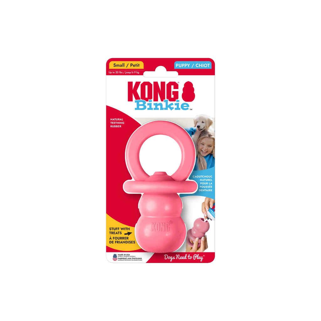 Juguete KONG Puppy Binkie rosado con forma de chupete, fabricado en goma suave para cachorros en etapa de dentición.