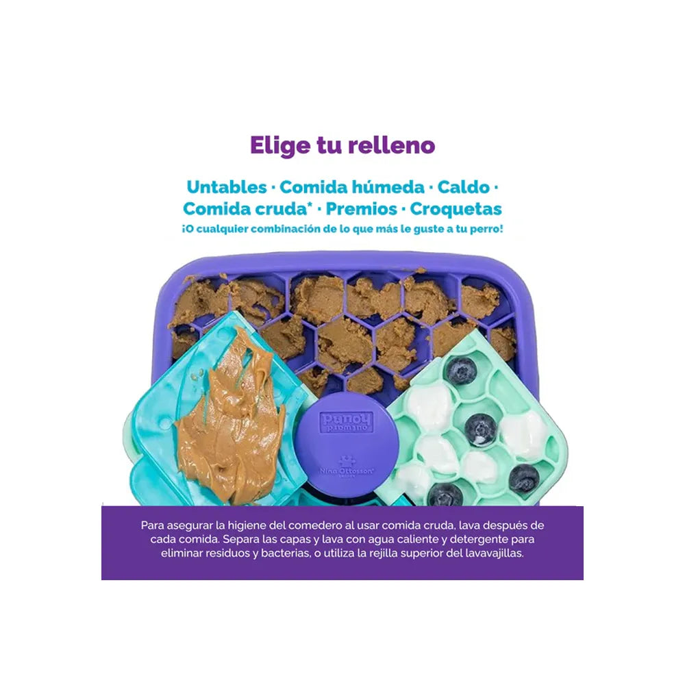 Nina Ottosson Lick N' Flip tablero interactivo con secciones texturizadas y tapas móviles en tonos verde y morado para estimulación mental
