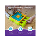 Nina Ottosson Puzzle Challange Slider para perros con tablero interactivo verde, piezas deslizantes azules con huellas y compartimentos