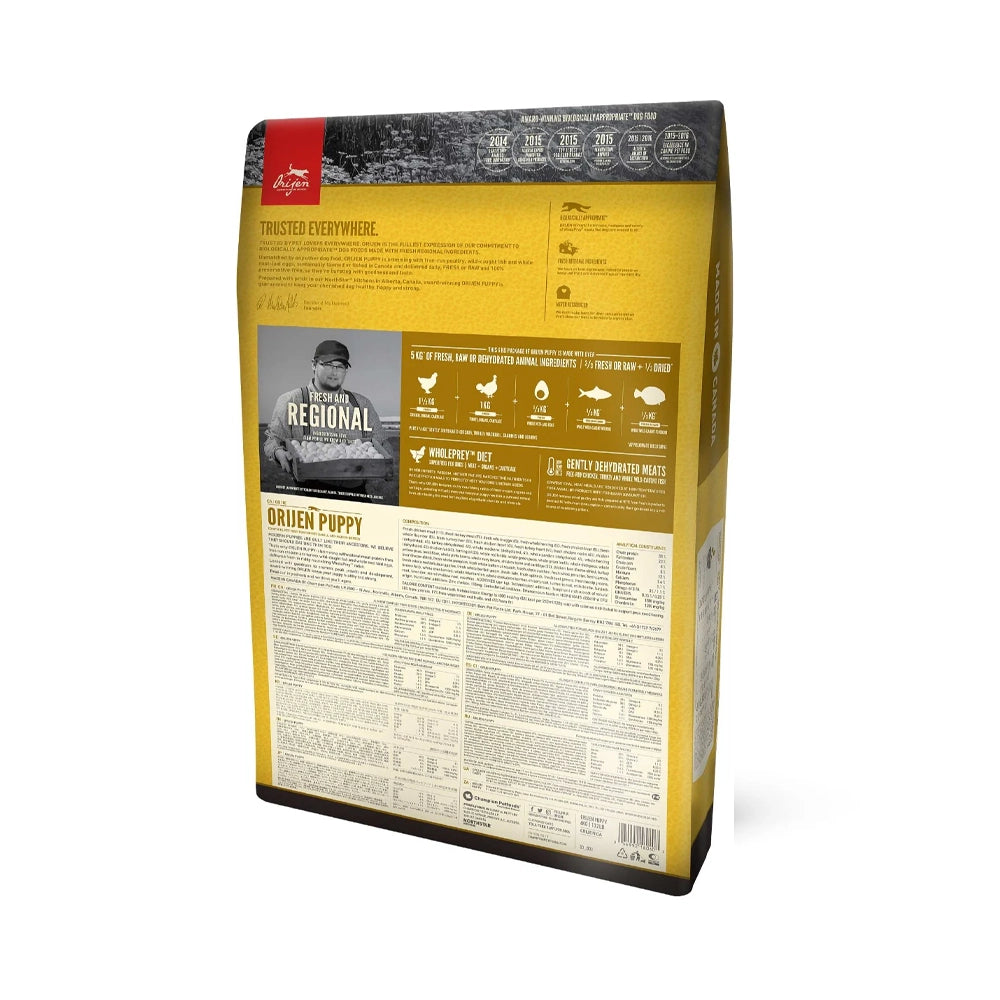 Orijen Puppy para Cachorros alimento seco premium con pollo de corral, pavo y pescado salvaje, receta rica en proteína.