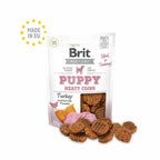 Snack Brit Meaty Coins de Pavo para Cachorros golosinas para perros con pavo y calabaza, bolsa con diseño blanco y snacks visibles