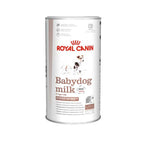 Royal Canin Babydog Milk Leche en polvo, alimento para cachorros lactantes, envase blanco con ilustración de perros pequeños.