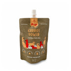 Winga Carrot Power para Perros en pouch de 250 g con tapa, suplemento 100% natural de zanahoria e ilustraciones de perros.