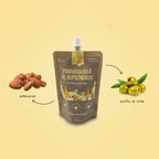 Winga Mantequilla de Almendras para Perros en pouch de 250 g con tapa dosificadora, envase natural e ilustraciones de perros.
